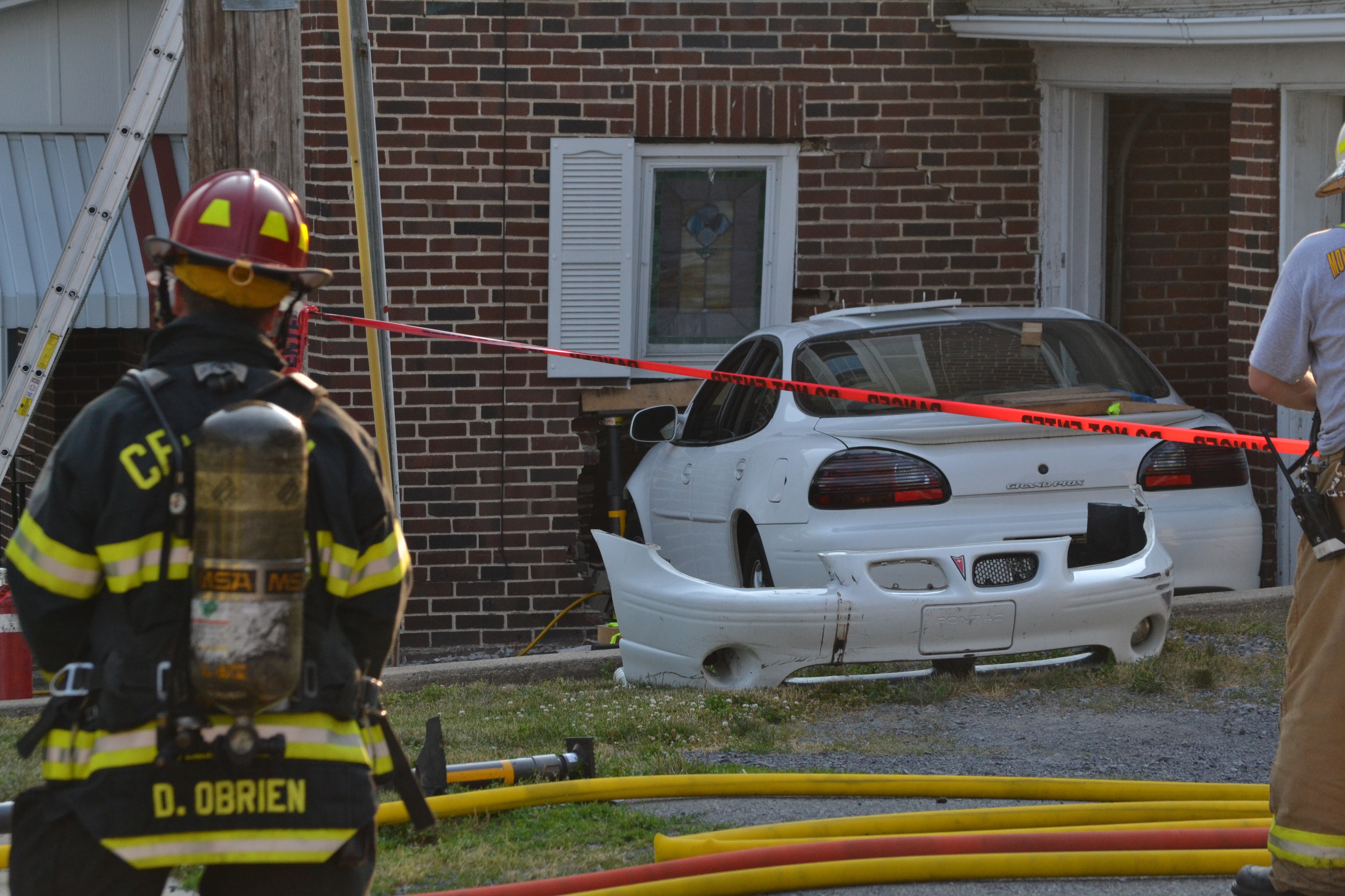 Car crashes into Muhlenberg home, neighborhood evacuated | Fire and Film